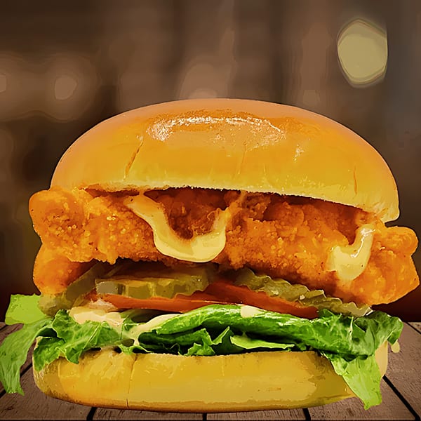 A Five Star Chicken fried chicken sandwich with lettuce, tomato, pickles, and sauce on a bun.